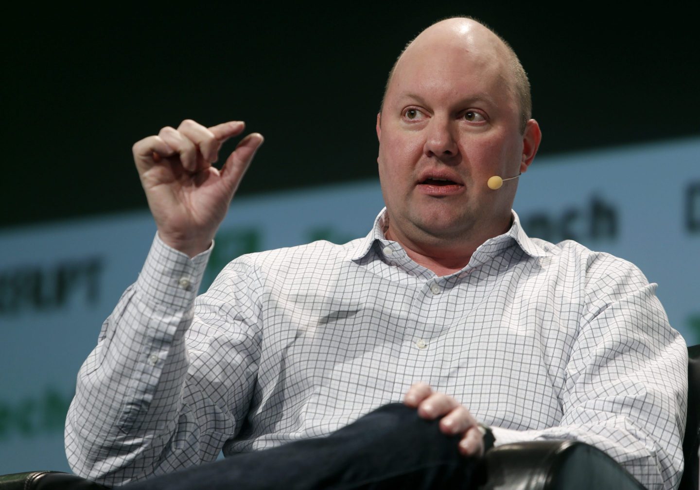 Marc Andreessen speaking at a tech event discussing corporate staffing strategies