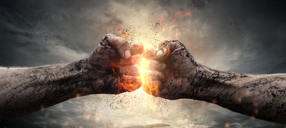 Two clenched fists collide in a dramatic illustration with sparks and a dark background, representing the conflict between security and performance.