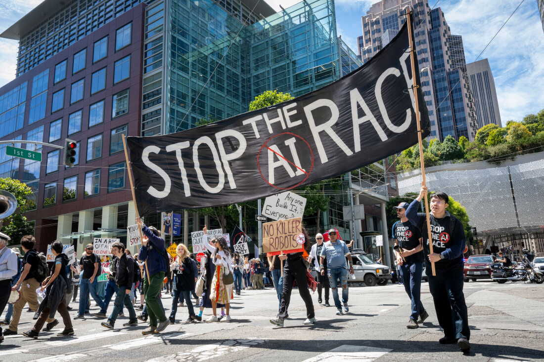 Demonstrators participate in the "Stop the AI Race" protest march in San Francisco on July 11, 2026.