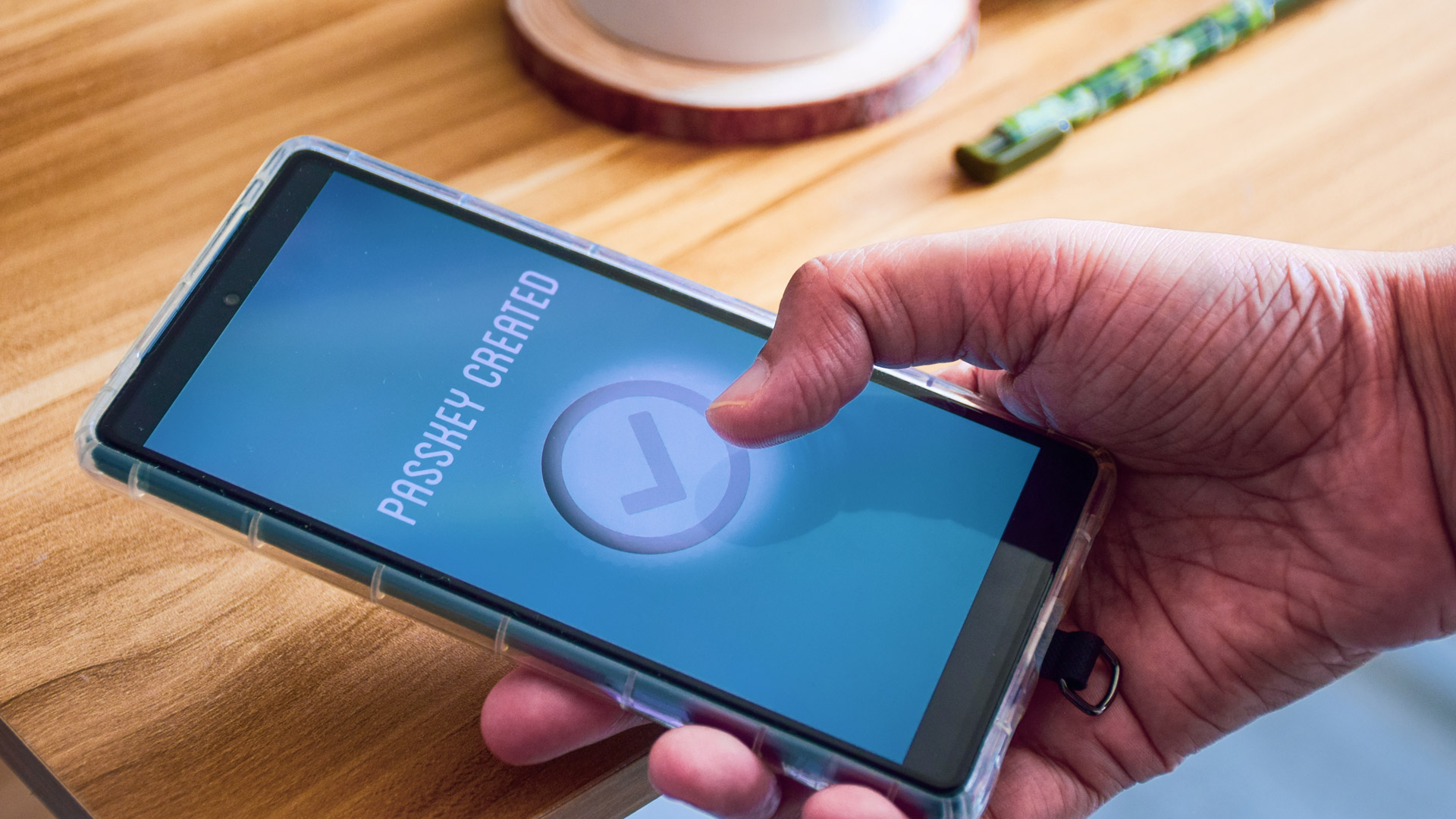 Conceptual image illustrating passkey security trade-offs with a phone and digital lock icon