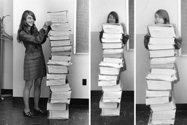 Computer scientist Margaret Hamilton poses with the Apollo guidance software she and her team developed at MIT